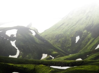 green mountain under white sky during daytime