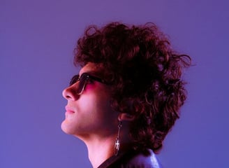 woman in black shirt wearing sunglasses