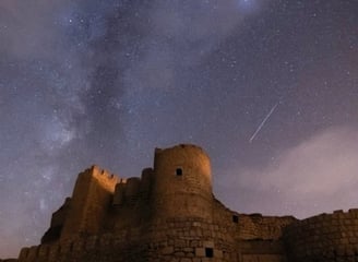 brown concrete building under starry night