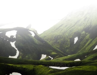 green mountain under white sky during daytime