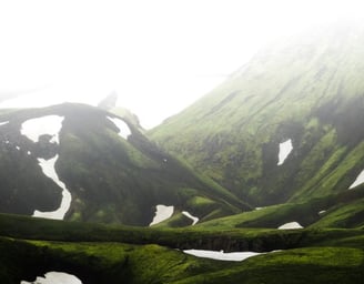 green mountain under white sky during daytime