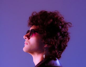 woman in black shirt wearing sunglasses