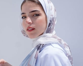 woman in white hijab smiling