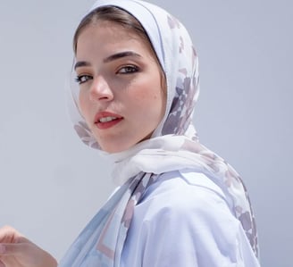 woman in white hijab smiling