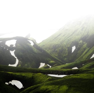 green mountain under white sky during daytime