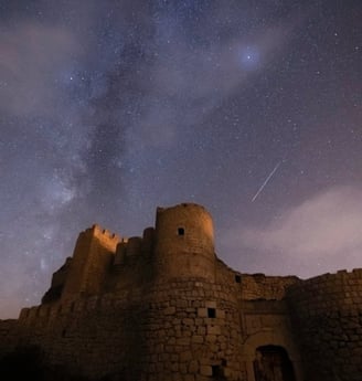 brown concrete building under starry night