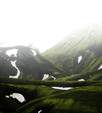 green mountain under white sky during daytime