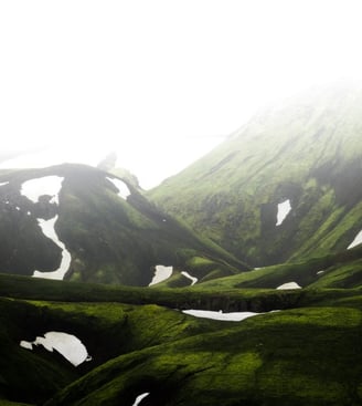 green mountain under white sky during daytime