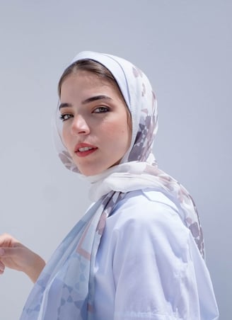 woman in white hijab smiling