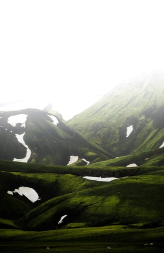 green mountain under white sky during daytime