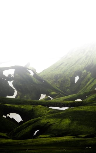 green mountain under white sky during daytime