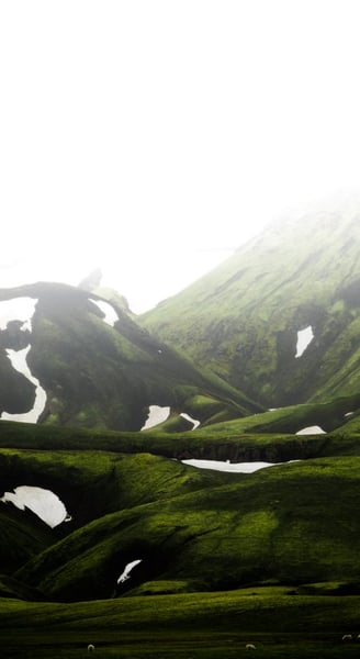 green mountain under white sky during daytime