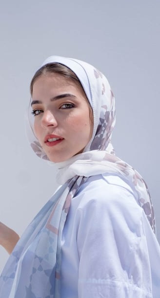 woman in white hijab smiling