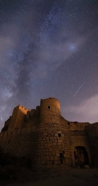 brown concrete building under starry night