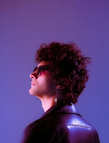 woman in black shirt wearing sunglasses