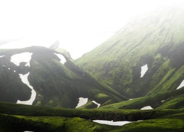 green mountain under white sky during daytime