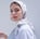 woman in white hijab smiling