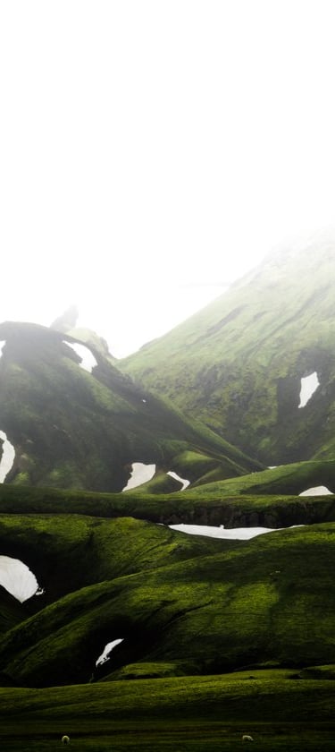 green mountain under white sky during daytime