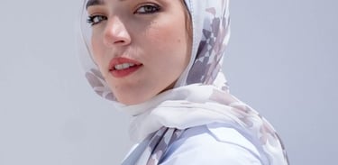 woman in white hijab smiling