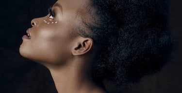 woman in blue and white shirt