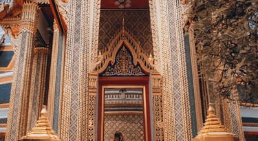 man and woman standing in front of brown concrete building during daytime