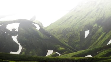green mountain under white sky during daytime