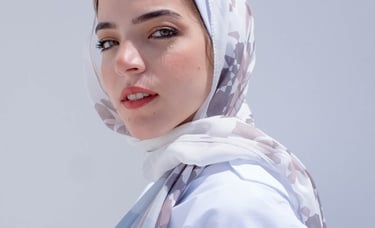 woman in white hijab smiling