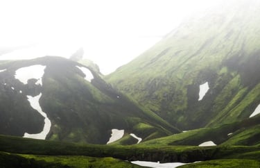 green mountain under white sky during daytime
