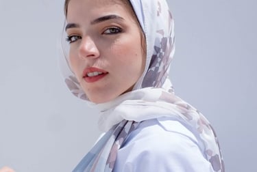 woman in white hijab smiling