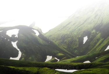 green mountain under white sky during daytime