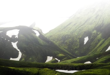 green mountain under white sky during daytime