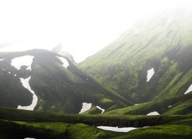 green mountain under white sky during daytime