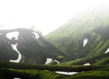 green mountain under white sky during daytime