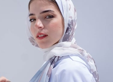 woman in white hijab smiling