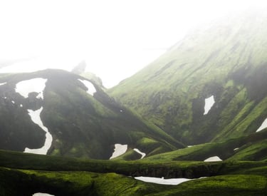 green mountain under white sky during daytime