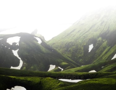 green mountain under white sky during daytime