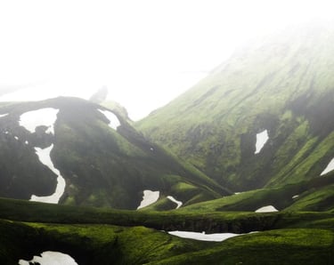 green mountain under white sky during daytime