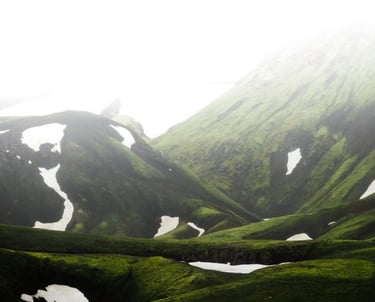 green mountain under white sky during daytime