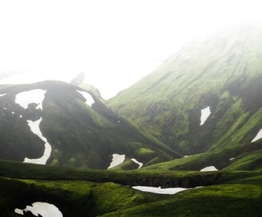 green mountain under white sky during daytime