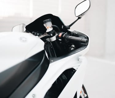 white and black sports bike