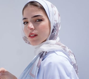 woman in white hijab smiling