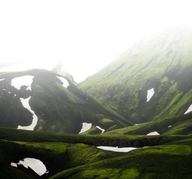 green mountain under white sky during daytime