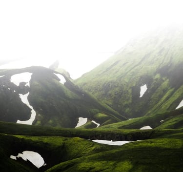 green mountain under white sky during daytime