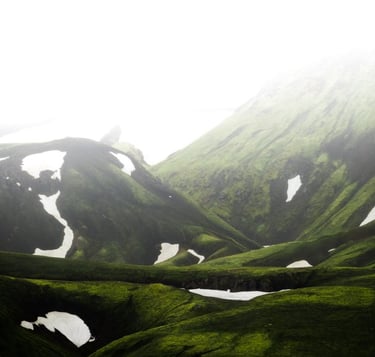 green mountain under white sky during daytime