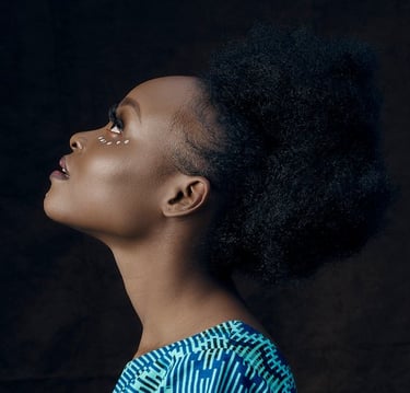 woman in blue and white shirt