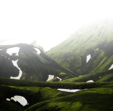 green mountain under white sky during daytime