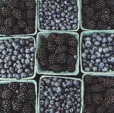 black berries on black surface