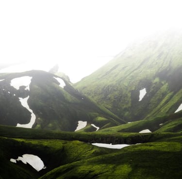 green mountain under white sky during daytime