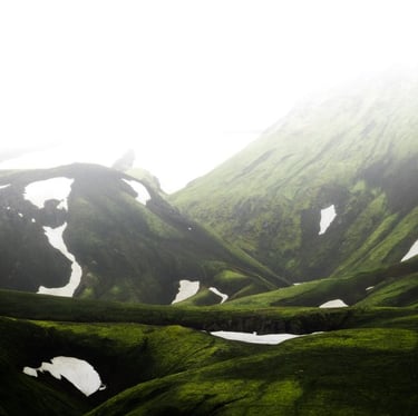 green mountain under white sky during daytime