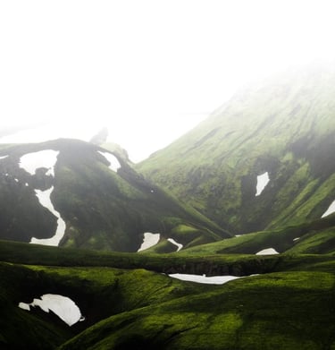 green mountain under white sky during daytime